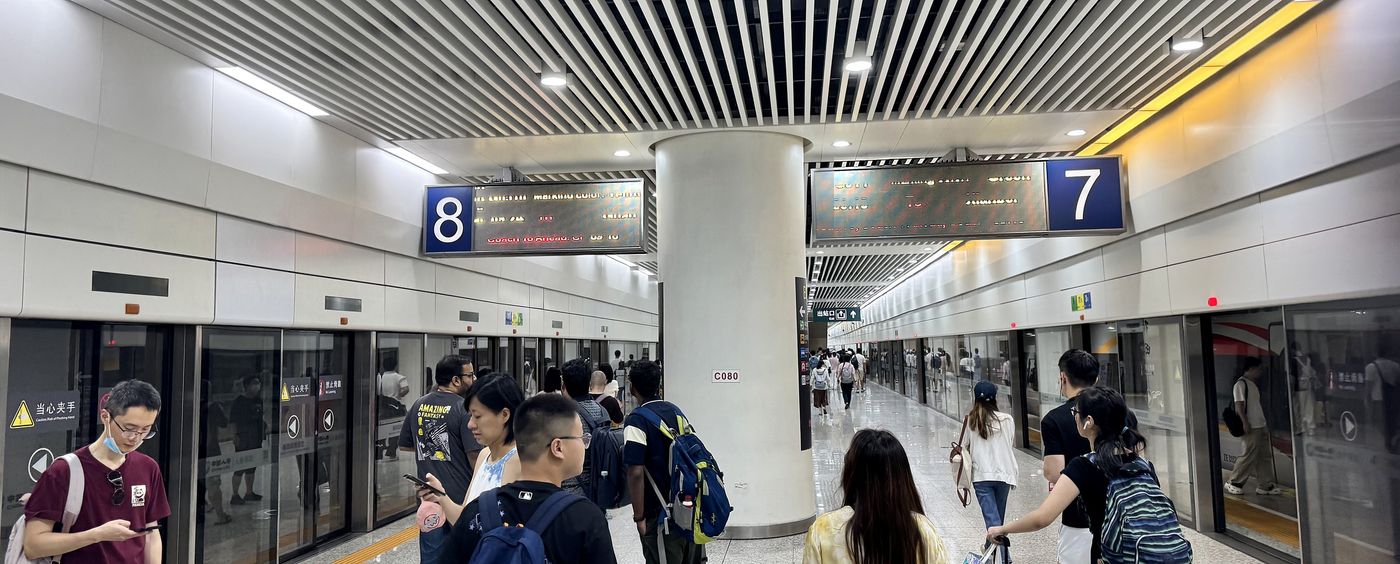 Platform view from gate 4B, showing platforms 7 and 8 with dot-matrix readouts